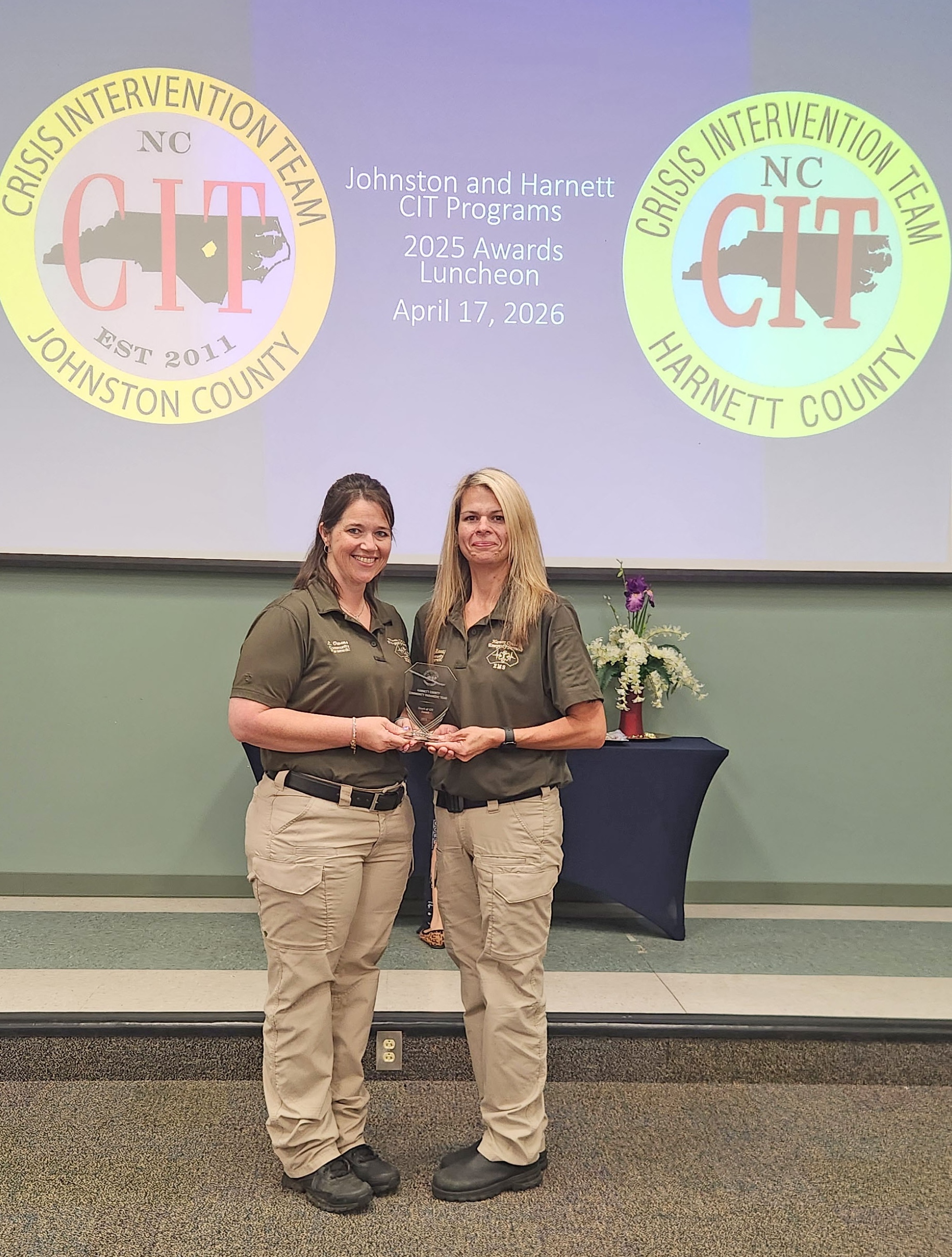 Picture of Jennifer and Leslie holding their award